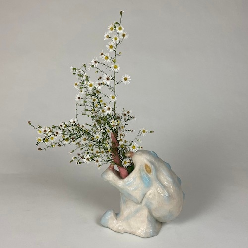 Portrait of  Wretched Flowers